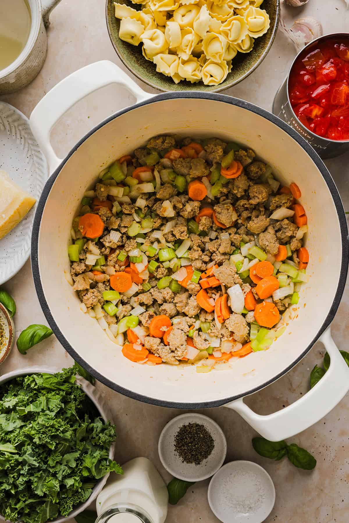 This Creamy Tortellini Soup is cozy, comforting and made with tender cheese tortellini, fresh veggies, herbs and a rich creamy broth. The perfect one pot meal that is both flavorful and satisfying!