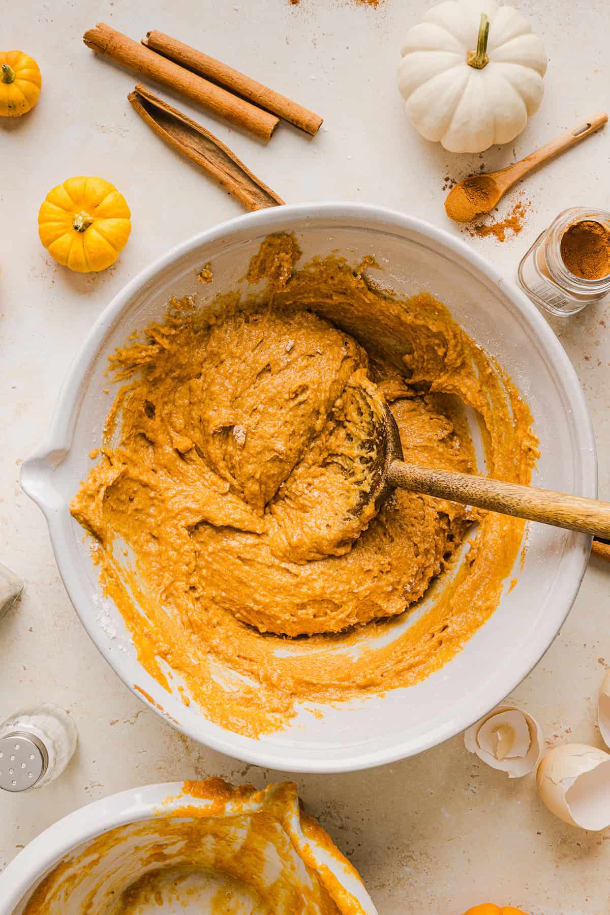 The BEST Healthy Pumpkin Bread that is moist, loaded with pumpkin flavor and made without any butter or refined sugar!  Topped with a delicious maple cream cheese glaze for the perfect fall treat this season!